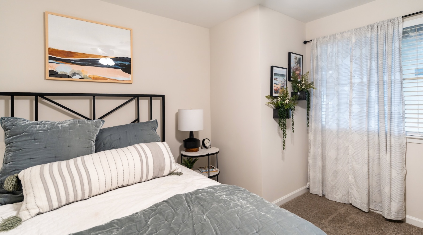 a bed with a white curtain